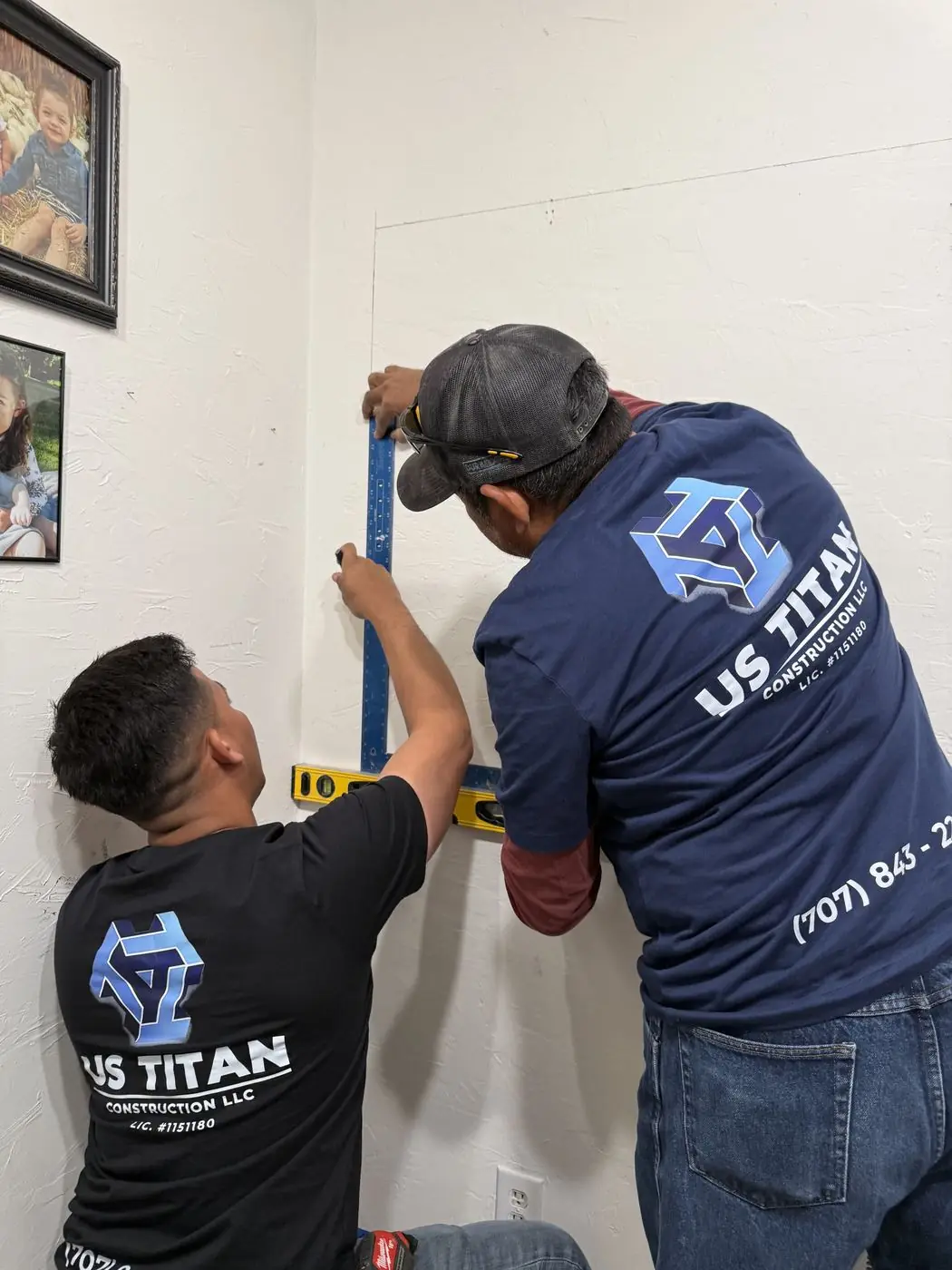 US TITAN crew leveling a wall on a job